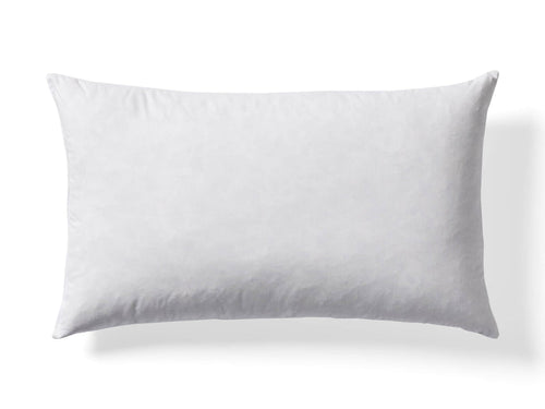 White rectangular pillow on a plain background, showcasing its smooth texture and lightly rounded edges.