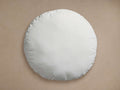 A round, white Water Repellent Outdoor Core Insert pillow, looking soft and plump, centered on a light brown background.