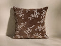 Front view of the brown cotton velvet Aisla Pillow with an embroidered ivory botanical design.