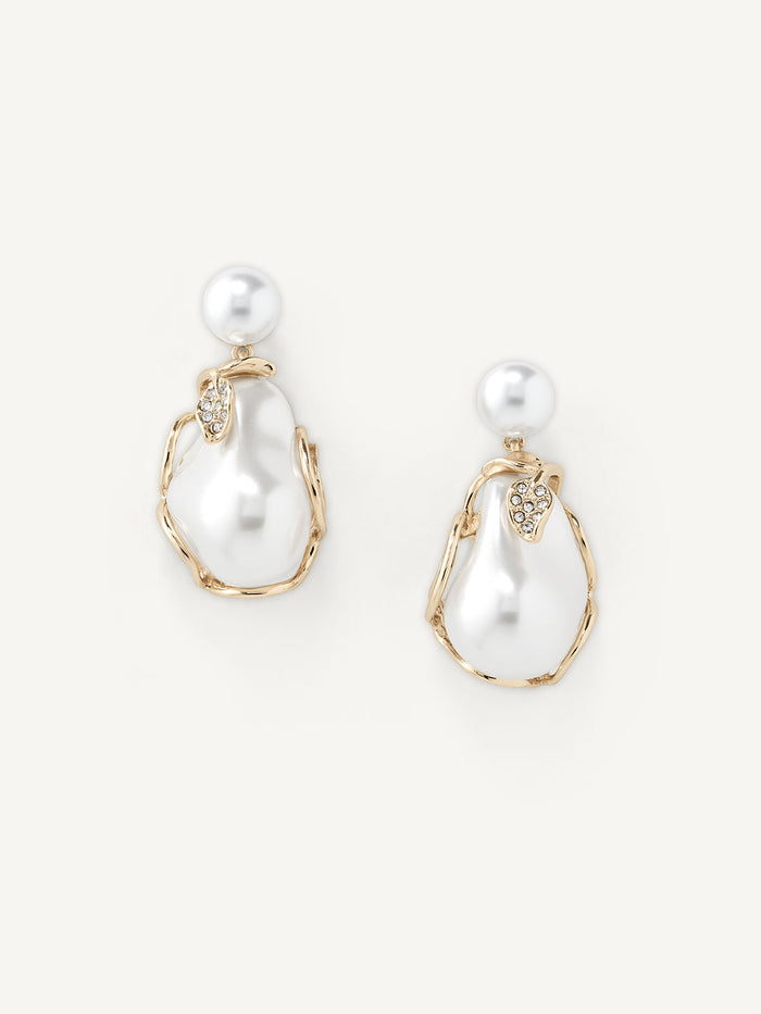Pearl earrings with gold accents on a white background
