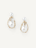 Pearl earrings with gold accents on a white background