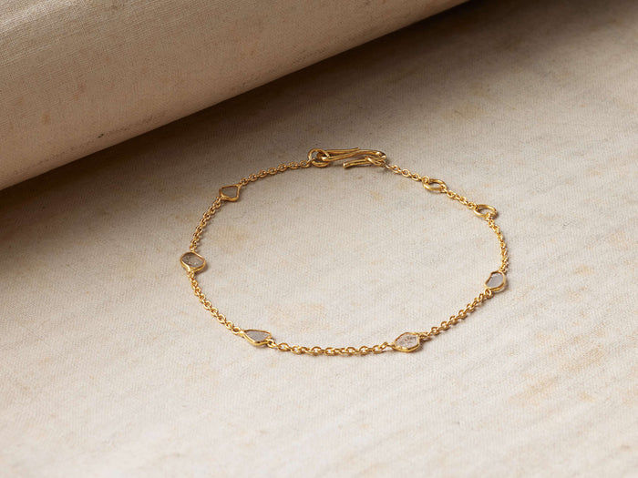 Alvita Bracelet featuring rose-cut diamonds and gold-plated sterling silver chain, with a shepherd's hook closure on a neutral background.