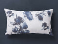 Amal Linen Sham on dark surface, with a digital floral pattern in shades of blue, featuring a rectangular shape.