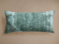 Rectangular Amanda Lumbar Pillow in sage green linen, featuring a subtle floral motif in varying shades of green.
