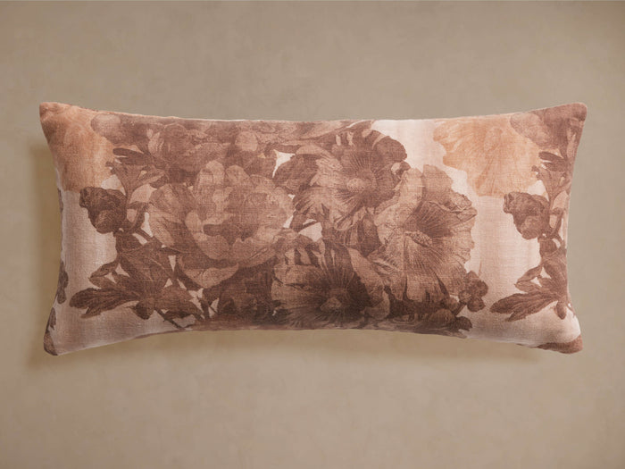 Amanda Lumbar Pillow, rectangular, with a brown and beige faded floral pattern, visible linen texture, on a neutral background.