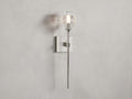 Amoroso Sconce featuring a sleek steel rod in a nickel finish, adorned with a hand-cut crystal bulb cover, mounted on a square backplate.