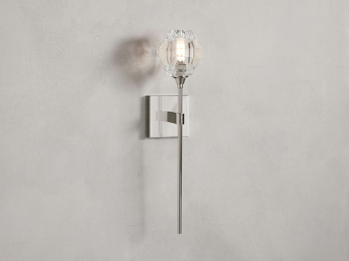 Amoroso Sconce featuring a sleek steel rod in a nickel finish, adorned with a hand-cut crystal bulb cover, mounted on a square backplate.