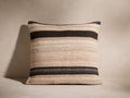 Square Aris Stripe Pillow with woven texture, featuring horizontal stripes in natural beige, light brown, and dark charcoal.
