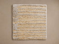 Artim Hand-Knotted Rug Swatch showcasing beige and light brown horizontal stripes with a textured, uneven finish on a plain background.