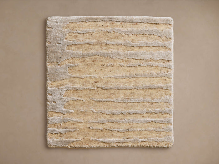 Artim Hand-Knotted Rug Swatch showcasing beige and light brown horizontal stripes with a textured, uneven finish on a plain background.