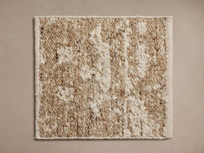 Atalie Rug Swatch featuring a textured weave with blended natural and ivory tones on a neutral background.