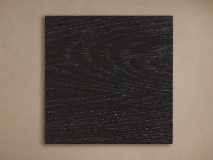 Bertogne Finish Board: Square, dark wood panel with prominent grain texture, centered against a light brown background.