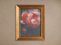 Vertical Blushing print: pink botanical flower on a dark background in an ornate, distressed antique gold frame.