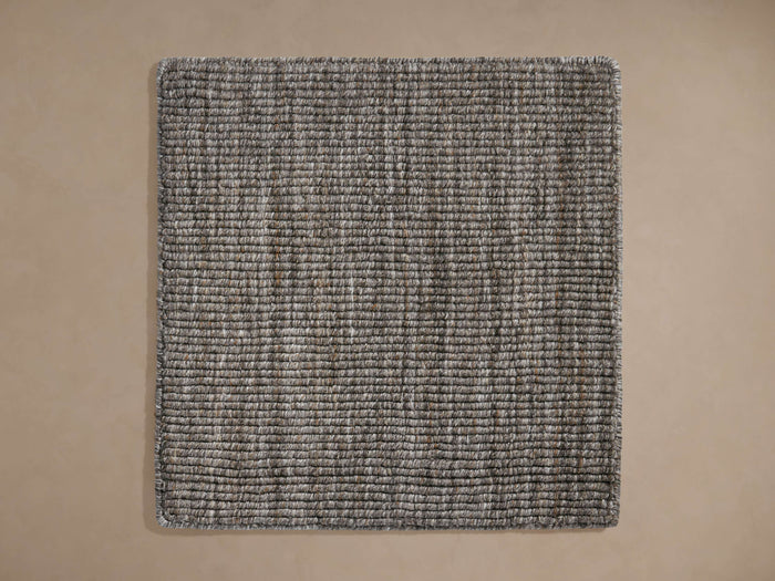 Square Bowman Performance Rug Swatch, tightly woven in multi-tonal grey-brown with rounded corners, on a neutral background.