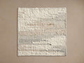 Bowyn Rug Swatch featuring a textured cream surface with subtle beige and grey accents, on a neutral background.