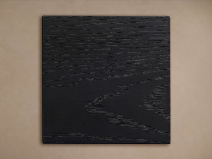 Calvin Finish Board: Black rectangular wood sample, rich horizontal grain texture, flat on a neutral background.