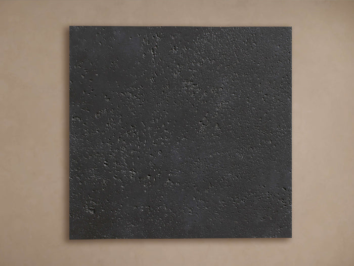 Rectangular Cascade Outdoor Finish Board, dark gray with rough, textured surface, against a warm brown background.