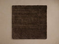 Square cashmere blend rug swatch in a deep brown shade with a soft texture, placed on a light-colored background.