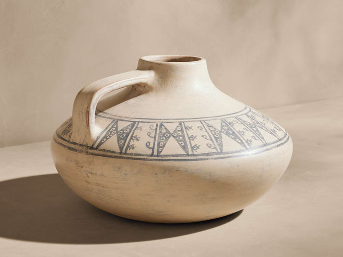Handcrafted Chancay Vase: a burnished cream terracotta vase with a handle & grey-blue traditional Peruvian patterns.