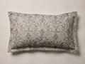 Front view of a light gray Corinne Sham with a sage green damask pattern and hemmed edges.