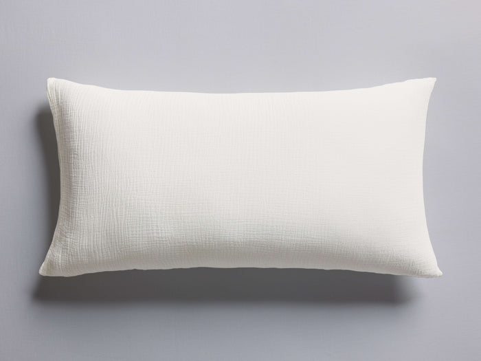 White rectangular Cotton Gauze Sham lying flat, showing its soft, crinkled texture. Simple gray background.