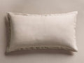 Rectangular Cupro Linen Sham in light beige, with a soft, subtly textured fabric, laid flat on a complementary neutral surface.
