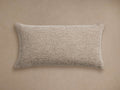 Dani Outdoor Lumbar Pillow, horizontal, light brown textured woven fabric, centered on a neutral beige background.