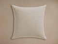 Dani Outdoor Pillow, square, light beige with fine horizontal woven texture, centered on a solid neutral background.