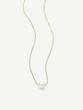A single freshwater pearl pendant necklace on a gold-plated chain, presented against a white background.