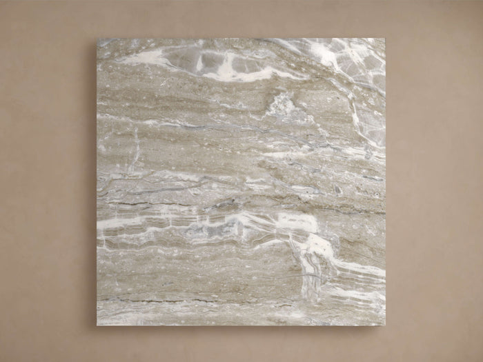 Edgewater Outdoor Finish Board in Faux Marble, a square panel with swirling gray, white, and brown veining, on a beige wall.