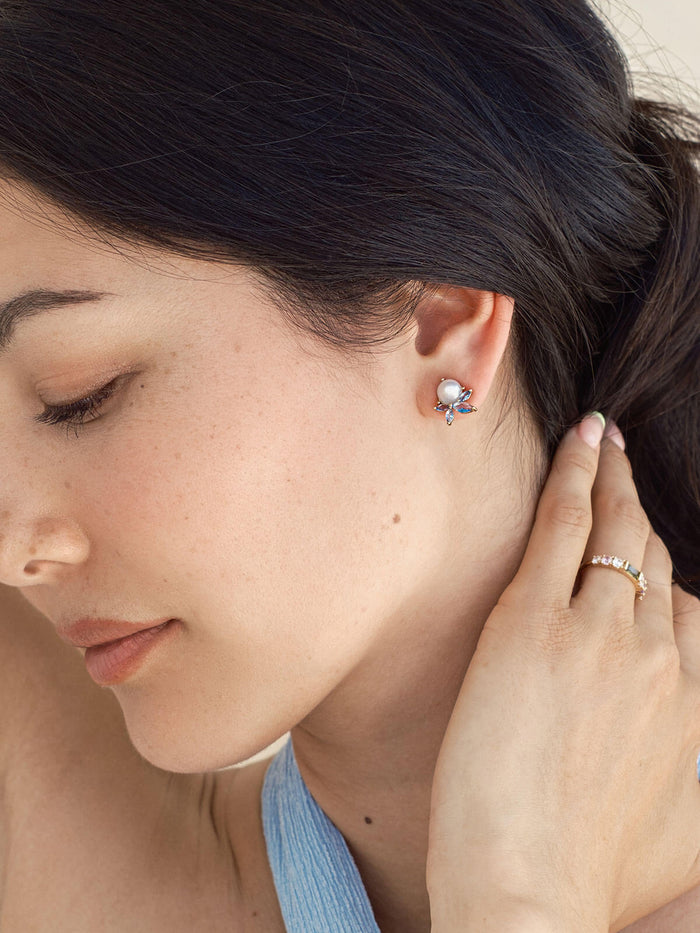 Ever Blue studs on a model