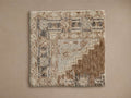 Ezra Hand-Knotted Rug Swatch with a textured, multicolored pattern featuring shades of beige, brown, and gray on a neutral background.
