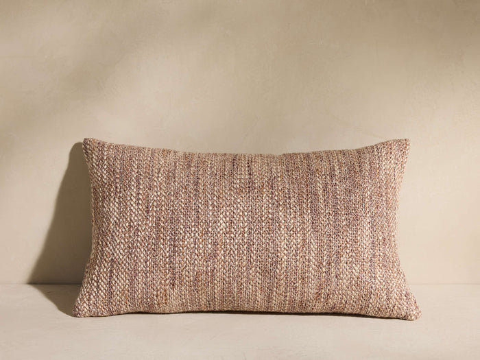 Fraisor Pillow: Rectangular, textured beige and brown woven pillow with subtle tonal variations, resting on a light surface.