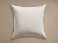 Granville Outdoor Pillow: Square, off-white cushion with a subtle horizontal woven texture, centered on a plain light tan background.