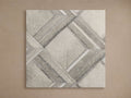Greer Rug Swatch with a textured, geometric pattern in shades of beige and gray on a neutral background.