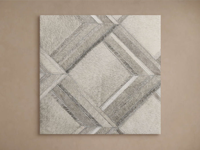 Greer Rug Swatch with a textured, geometric pattern in shades of beige and gray on a neutral background.