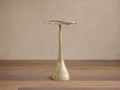 Front view of the Gold Abalone Shell Accent Table with a wavy, shell-shaped top and a slender, textured base.
