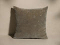 Front view of a taupe Hand-Beaded Snowflake Pillow in velvet, featuring metallic embroidered snowflakes, sequins, and beads.