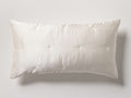 Rectangular Hand-Tucked Silk Sham in cream with subtle sheen and hand-tufted detailing, oriented horizontally.