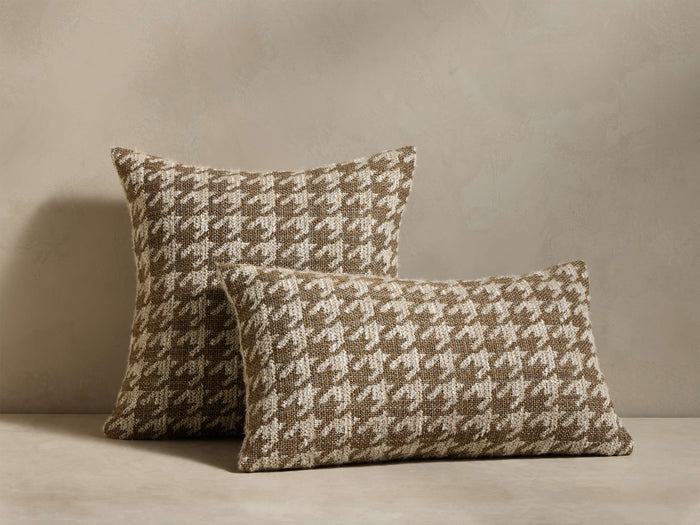 Front view of two Hounds Pillows, one square and one rectangular, displaying a brown and cream houndstooth woven pattern.