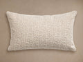 Inslee Outdoor Lumbar Pillow. Off-white, rectangular, with textured chenille abstract crosshatch pattern, shown horizontally.