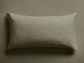 Sage green Italian Garment-Dyed Linen Sham, rectangular, with a soft, relaxed texture, lying flat on a matching surface.