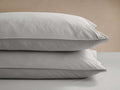Set of 2 light gray Italian Garment-Dyed Percale Pillowcases, stacked showing soft texture, visible seams, on a neutral background.