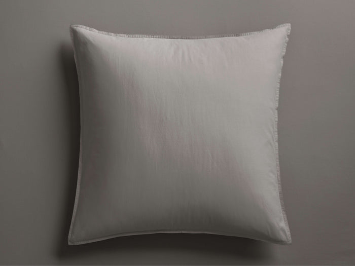 Square light gray Italian Garment-Dyed Percale Sham, softly textured, with knife-edge seams, centered on a gray surface.