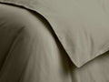 Close-up of a draped Italian Garment-Dyed Sateen Duvet in a muted olive green, showing soft folds and subtle sheen.