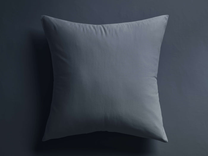 Italian Garment-Dyed Sateen Sham in a deep slate blue, centered, lying flat on a slightly darker background.