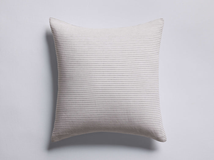 Italian Yarn-Dyed Stripe Sham: A soft, off-white square sham with numerous thin, dark grey horizontal stripes.
