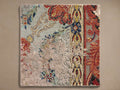 Square Josephine Hand-Knotted Rug Swatch with distressed ornate pattern in muted blue, orange, yellow, and beige.