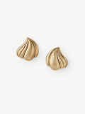 A pair of gold stud earrings with a ribbed, meringue-like textured design, displayed on a clean off-white background.