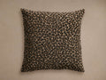 Leonie Pillow, rectangular, with textured black, brown, and beige leopard print, against a neutral background.